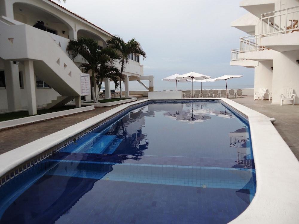 Hotel Bagasi มานซานิโญ ภายนอก รูปภาพ