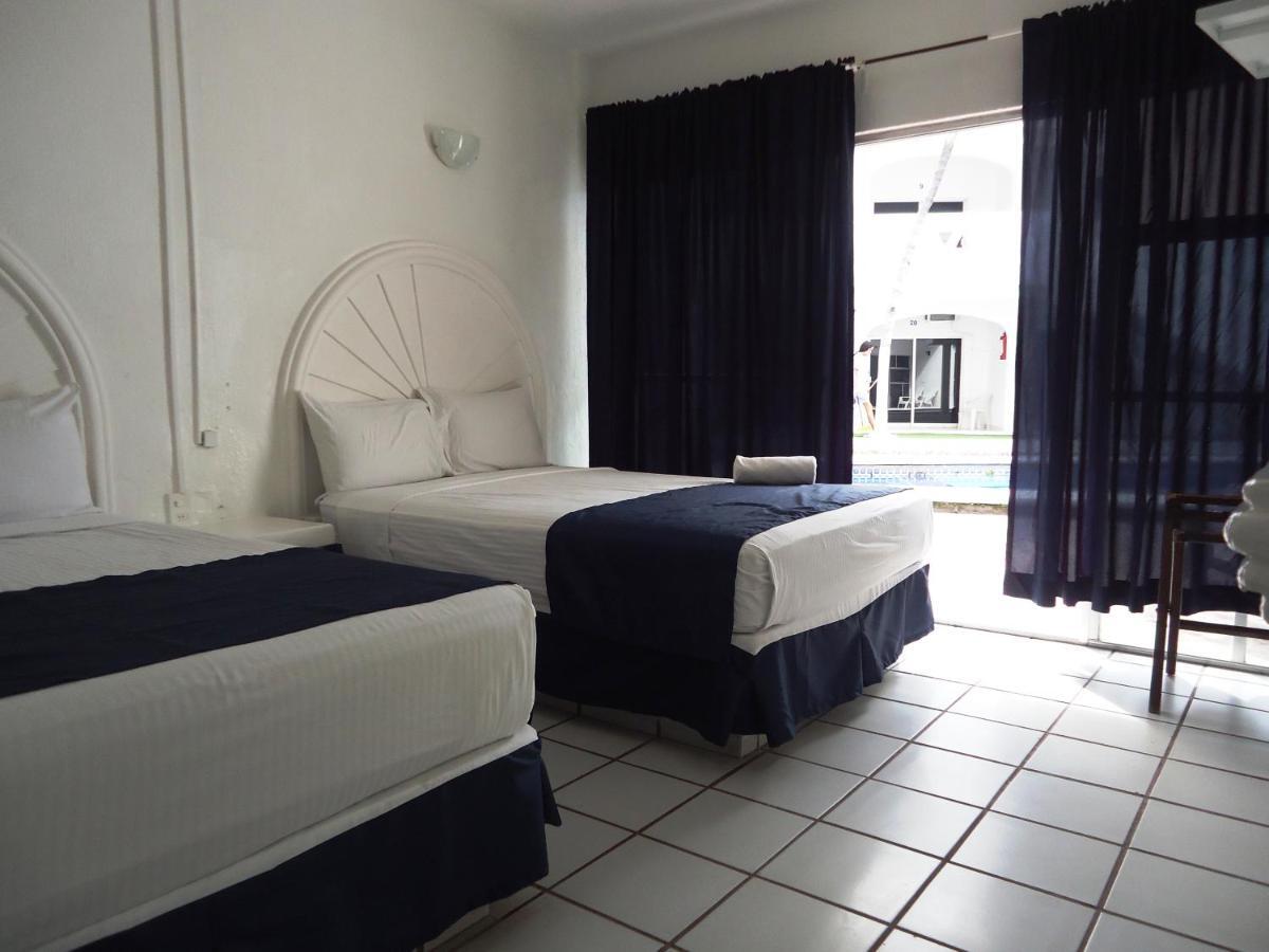 Hotel Bagasi มานซานิโญ ภายนอก รูปภาพ