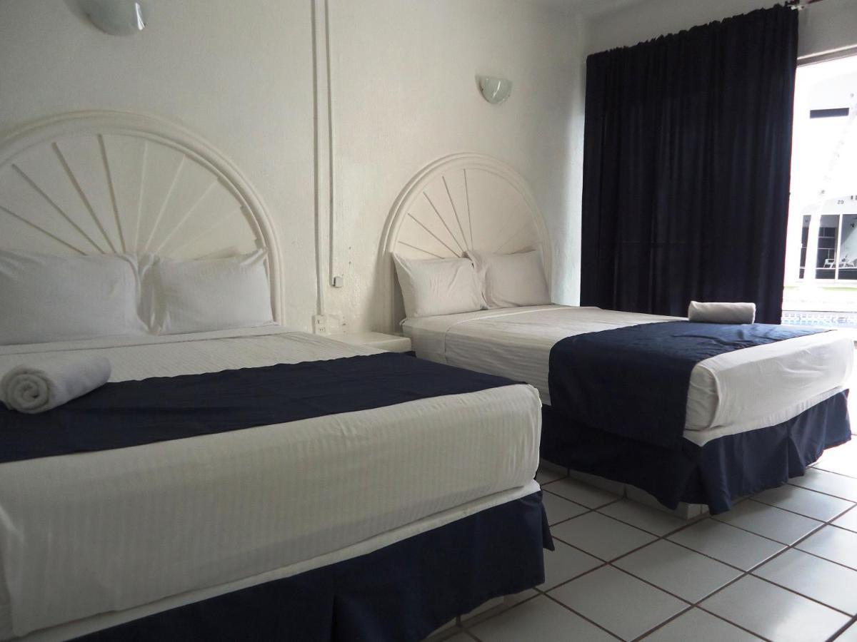 Hotel Bagasi มานซานิโญ ภายนอก รูปภาพ